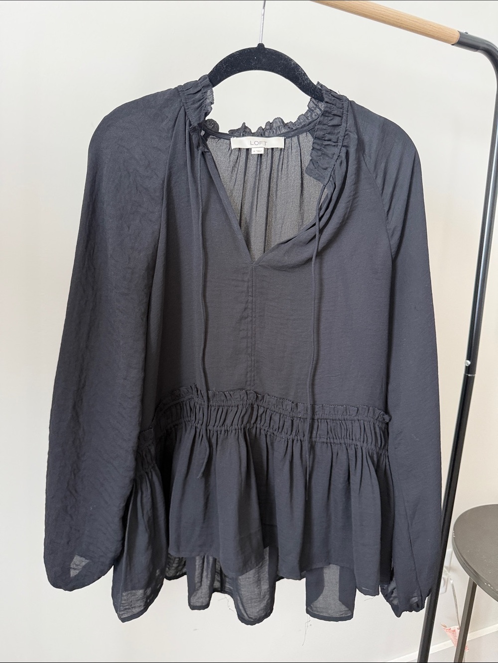 Black Peplum Blouse with Ruffle Neck
